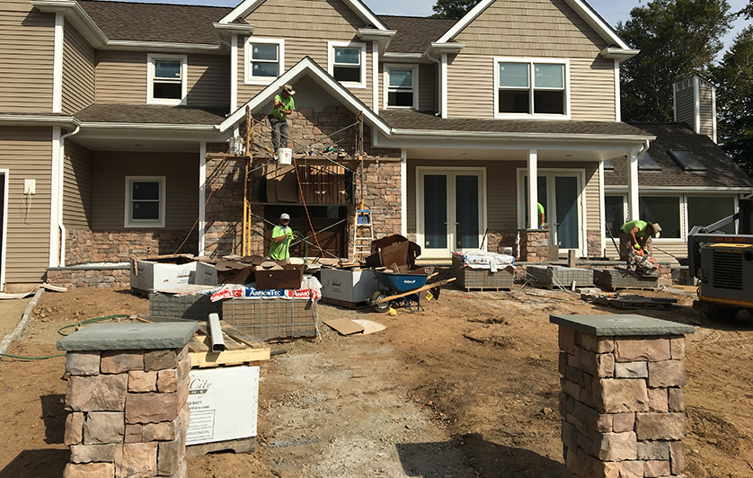 Men Working on Residential Property